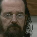 Bank robber Paul Stavenjord was back in the news in big way in the late 1990s. In this KTUU-television images, he is seen here in law-enforcement custody.
