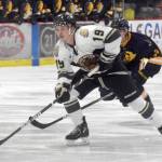 Kenai River Brown Bears forward Parker Lockwood attacks against the Springfield (Illinois) Jr. Blues on Friday, Nov. 19, 2021, at the Soldotna Regional Sports Complex in Soldotna, Alaska. (Photo by Jeff Helminiak/Peninsula Clarion)