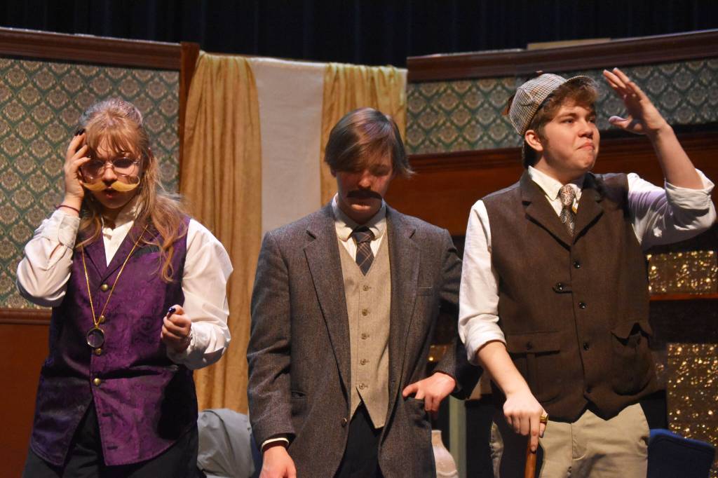 JLee Webster as the King of Bohemia, Darek Hatten as John Watson, and Josiah Burton as Sherlock Holmes rehearse Sherlock Holmes: The Final Adventure at Soldotna High School in Soldotna, Alaska, on Wednesday, April 12, 2023. (Jake Dye/Peninsula Clarion)