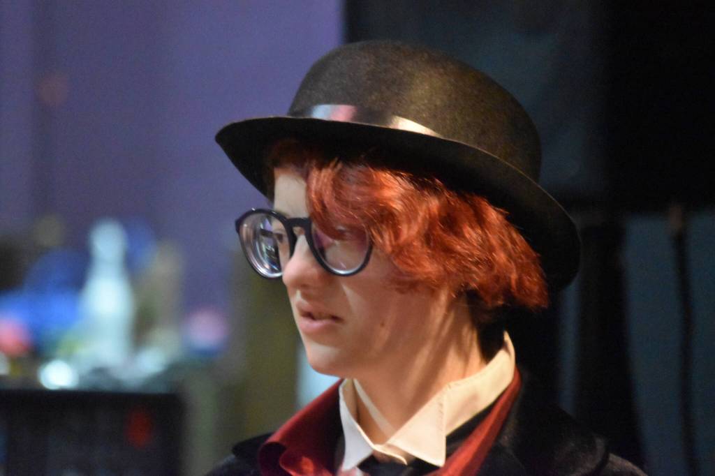 Rory Funk portrays Moriarty during a rehearsal of Sherlock Holmes: The Final Adventure at Soldotna High School in Soldotna, Alaska, on Wednesday, April 12, 2023. (Jake Dye/Peninsula Clarion)