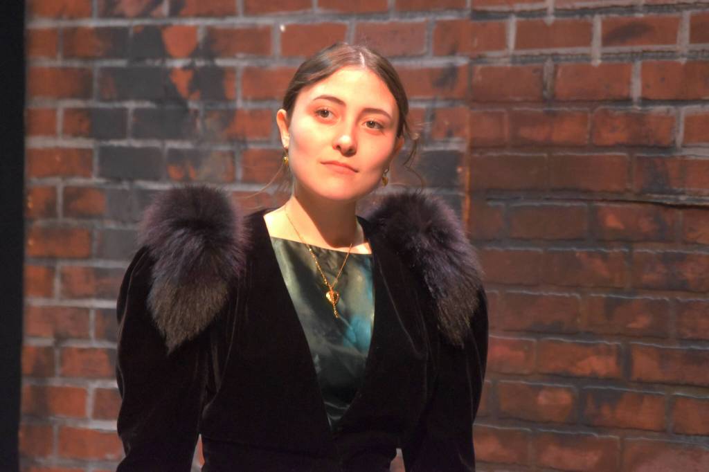 Sophia Micciche portrays Irene Adler during a rehearsal of Sherlock Holmes: The Final Adventure at Soldotna High School in Soldotna, Alaska, on Wednesday, April 12, 2023. (Jake Dye/Peninsula Clarion)