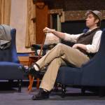 Josiah Burton portrays Sherlock Holmes during a rehearsal of Sherlock Holmes: The Final Adventure at Soldotna High School in Soldotna, Alaska, on Wednesday, April 12, 2023. (Jake Dye/Peninsula Clarion)