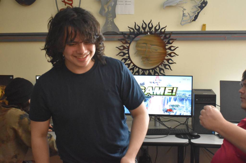 Kenai Centrals Eli Castro walks away from the monitor after sweeping Delta Junctions Josh McCall in the playoffs for Alaska high school Super Smash Bros. Ultimate on Friday, April 14, 2023 at Kenai Central High School in Kenai, Alaska. (Jake DyePeninsula Clarion)