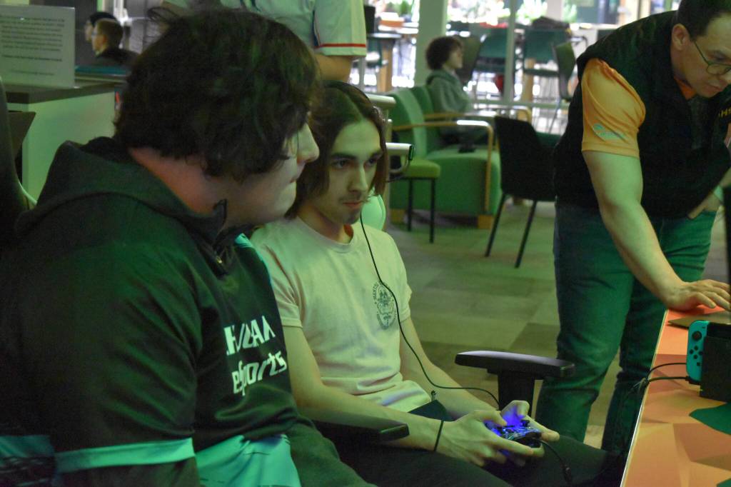 Chugiaks Elliott Barnes and Kenais Cody Good compete in the final match of the Super Smash Bros. Ultimate State Championship on Saturday, April 22, 2023, at the University of Alaska Anchorage Esports Lounge in Anchorage, Alaska. (Jake Dye/Peninsula Clarion)