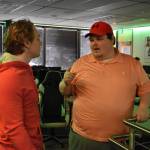 Kenai Centrals Kage Adkins talks to Coach Matthew Cross after the last match of the Super Smash Bros. Ultimate State Championship on Saturday, April 22, 2023, at the University of Alaska Anchorage Esports Lounge in Anchorage, Alaska. (Jake Dye/Peninsula Clarion)