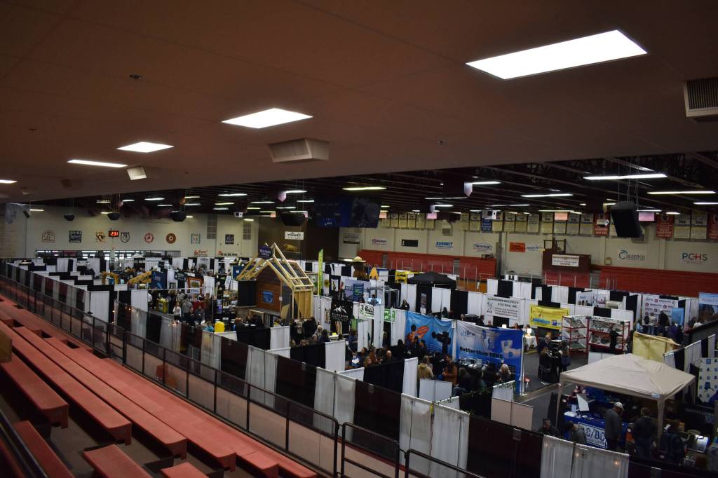 Booths and people fill the floor at the 43rd Annual Home Show hosted by the Kenai Peninsula Builders Association on Sunday, April 23, 2023, at the Soldotna Regional Sports Complex in Soldotna, Alaska. (Jake Dye/Peninsula Clarion)
