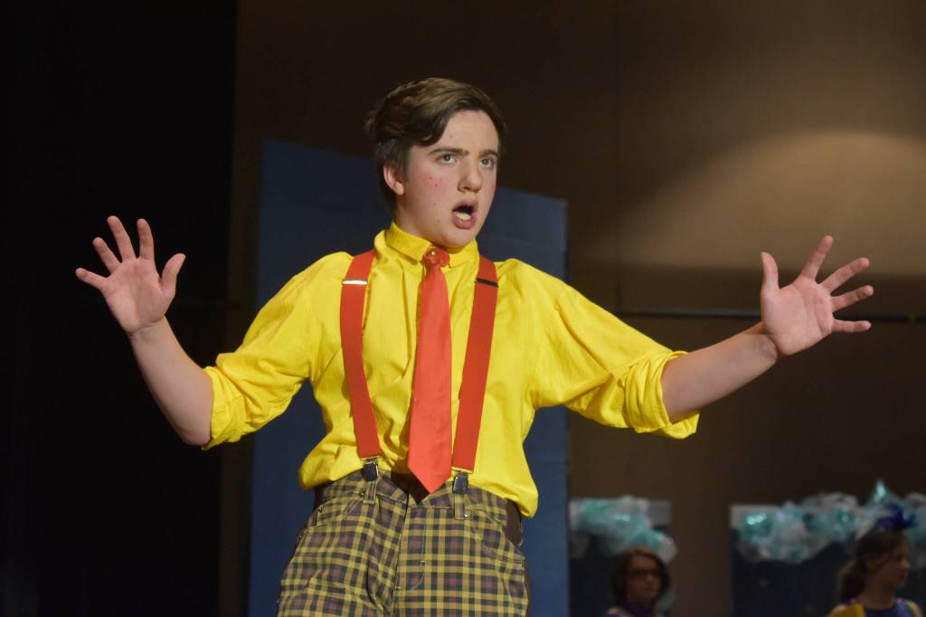 Jackson Hooper portrays SpongeBob SquarePants during a rehearsal of SpongeBob SquarePants on Saturday, April 15, 2023, at Nikiski Middle/High School in Nikiski, Alaska. (Jake Dye/Peninsula Clarion)