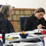 Kenai City Council members Deborah Sounar, left, and Teea Winger review budget documents during a work session on Saturday, April 29, 2023 in Kenai, Alaska. (Ashlyn OHara/Peninsula Clarion)
