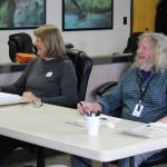 Poll workers Patricia Linville (left) and Mark Kansteiner (right) prepare to assist voters in Sewards special election on Tuesday, May 2, 2023, in Seward, Alaska. (Ashlyn OHara/Peninsula Clarion)
