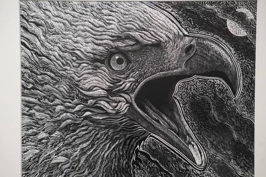 A stylized drawing of an eagle by artist Nathan Perry hangs as part of Elaborate Expressions at the Kenai Art Center in Kenai, Alaska on May 3, 2023. (Jake Dye/Peninsula Clarion)