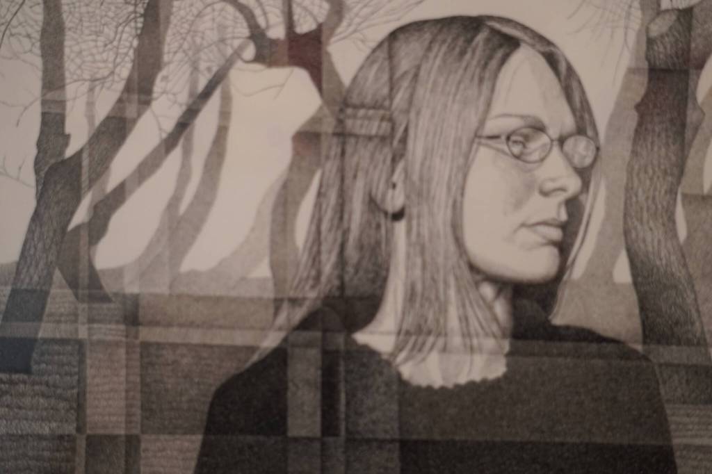 A drawing of a woman by artist Nathan Perry hangs as part of Elaborate Expressions at the Kenai Art Center in Kenai, Alaska on May 3, 2023. (Jake Dye/Peninsula Clarion)