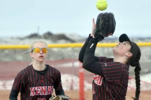 Kenai Central second baseman Kailey Stynsberg makes the catch in front of shortstop Zoey Riley on Thursday, May 4, 2023, at Steve Shearer Memorial Ball Park in Kenai, Alaska. (Photo by Jeff Helminiak/Peninsula Clarion)