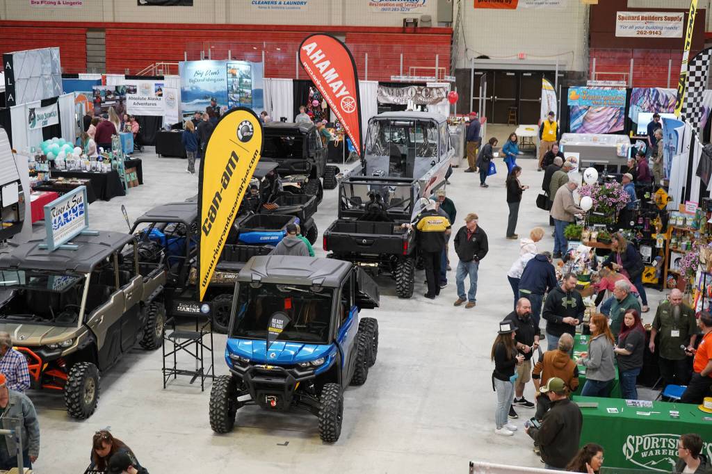 Vehicles and vendors fill the floor at the Kenai Peninsula Sport, Rec & Trade Show on Saturday, May 6, 2023, at the Soldotna Regional Sports Complex in Soldotna, Alaska. (Jake Dye/Peninsula Clarion)