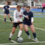 Kenai Centrals Chloe Goldsby and Soldotnas Anika Jedlicka battle for the ball Monday, May 8, 2023, at Justin Maile Field at Soldotna High School in Soldotna, Alaska. (Photo by Jeff Helminiak/Peninsula Clarion)