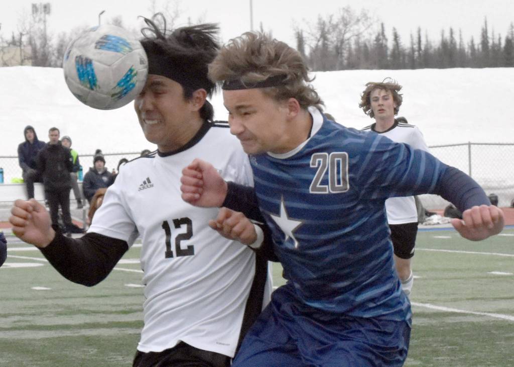 Kenai Centrals Enrique Mercado and Soldotnas Johnny Wardas battle for the ball Monday, May 8, 2023, at Justin Maile Field at Soldotna High School in Soldotna, Alaska. (Photo by Jeff Helminiak/Peninsula Clarion)