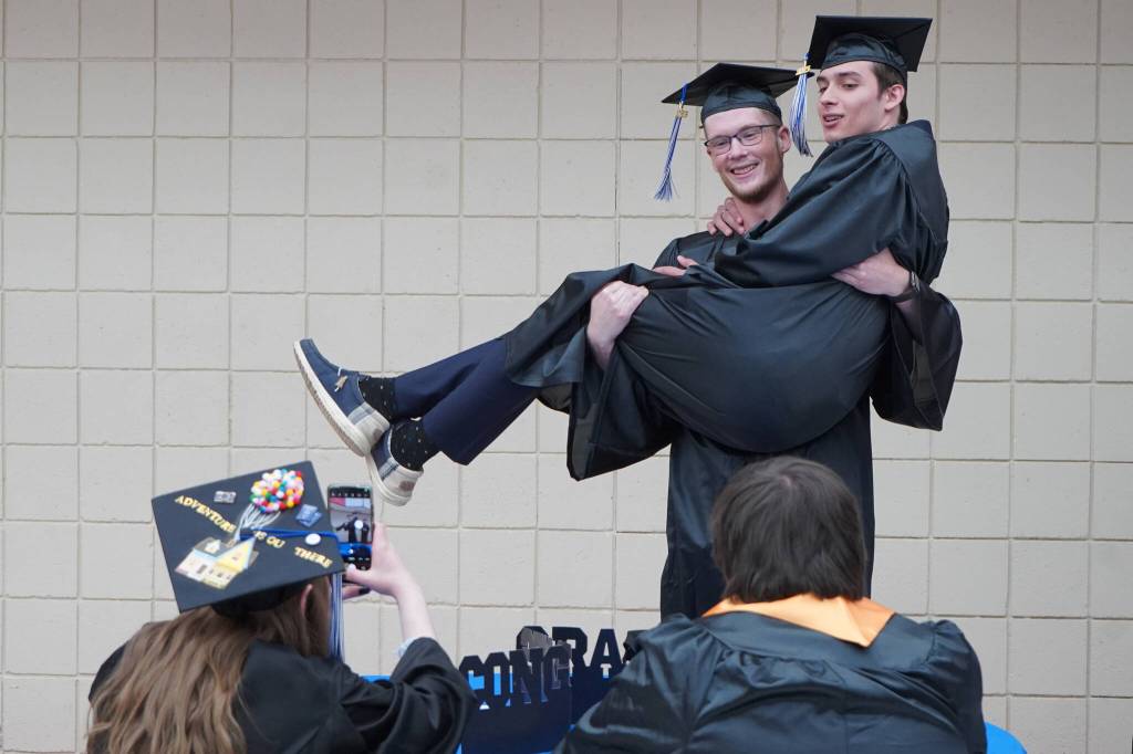 Kenai Peninsula College graduates are staged ahead of Kenai Peninsula Colleges 53rd annual commencement on Thursday, May 11, 2023, at Kenai Central High School in Kenai, Alaska. (Jake Dye/Peninsula Clarion)