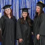 Kenai Peninsula College graduates stand for photos ahead of Kenai Peninsula Colleges 53rd annual commencement on Thursday, May 11, 2023, at Kenai Central High School in Kenai, Alaska. (Jake Dye/Peninsula Clarion)