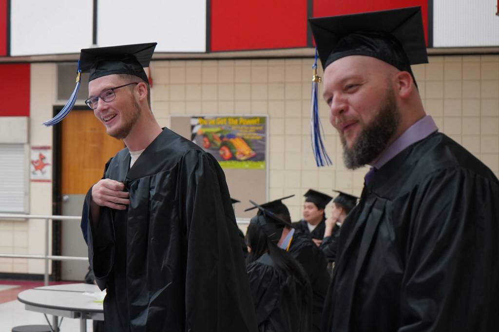 Kenai Peninsula College graduates are staged ahead of Kenai Peninsula Colleges 53rd annual commencement on Thursday, May 11, 2023, at Kenai Central High School in Kenai, Alaska. (Jake Dye/Peninsula Clarion)