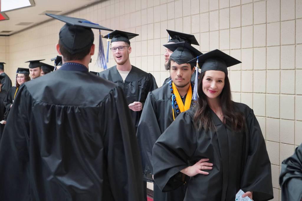 Kenai Peninsula College graduates are staged ahead of Kenai Peninsula Colleges 53rd annual commencement on Thursday, May 11, 2023, at Kenai Central High School in Kenai, Alaska. (Jake Dye/Peninsula Clarion)