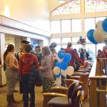 Kachemak Bay Campus graduates and their family members enjoy a reception gathering after the 2023 KBC Commencement on Wednesday, May 10, 2023, in Homer, Alaska. (Photo by Delcenia Cosman/Homer News)
