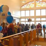 Kachemak Bay Campus faculty, staff and graduates and their family members enjoy a reception gathering in the Pioneer Hall commons after the 2023 KBC Commencement on Wednesday, May 10, 2023, in Homer, Alaska. (Photo by Delcenia Cosman/Homer News)