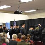 The 2023 graduates turn their tassels to the left as University of Alaska Anchorage Vice Chancellor Deanna Woodard confers the degrees during the 2023 KBC Commencement on Wednesday, May 10, 2023, in Homer, Alaska. (Photo by Delcenia Cosman/Homer News)