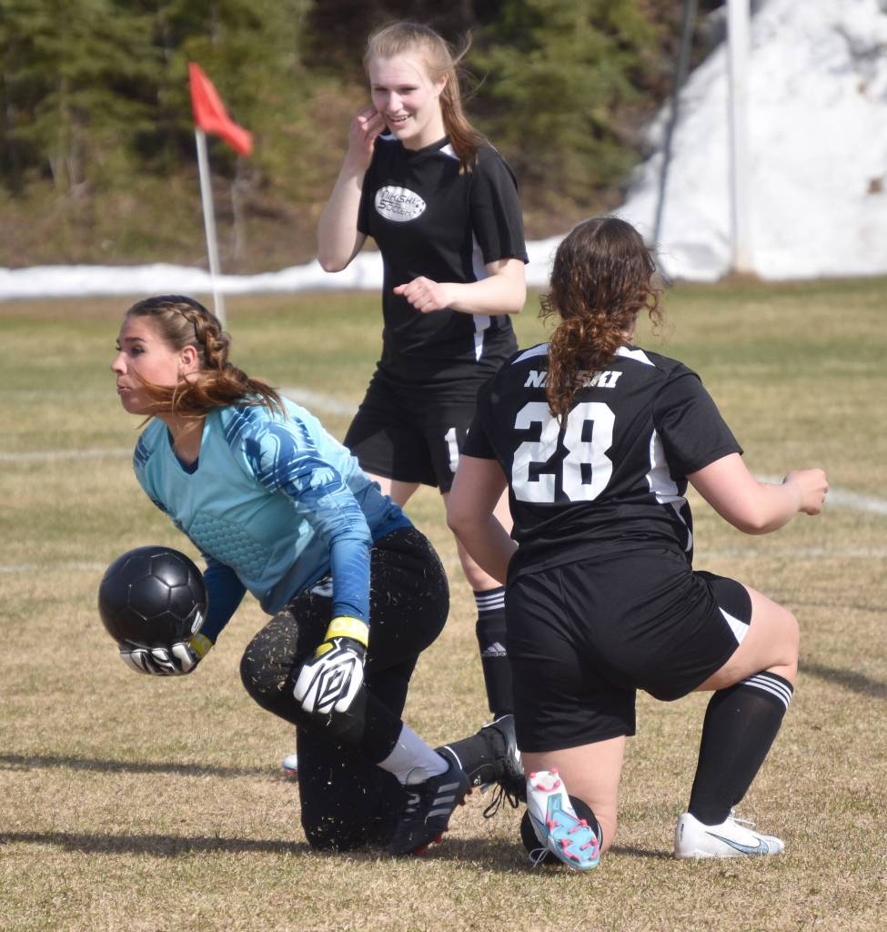 Nikiski goalie Emma Weeks makes a save against Soldotna on Friday, May 12, 2023, at Nikiski High School in Nikiski, Alaska. (Photo by Jeff Helminiak/Peninsula Clarion)