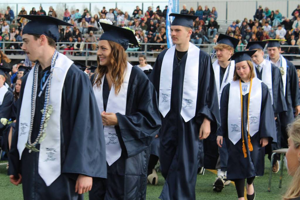 Soldotna High School graduates line up to receive diplomas during a ceremony on Monday, May 15, 2023, in Soldotna, Alaska. (Ashlyn OHara/Peninsula Clarion)