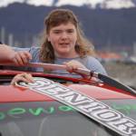 Seward graduates parade down 4th Avenue in Seward, Alaska on Friday, May 12, 2023. (Jake Dye/Peninsula Clarion)