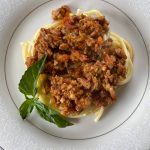 This meaty sauce is savory and herbaceous and is well worth the four hours of simmer time. (Photo by Tressa Dale/Peninsula Clarion)