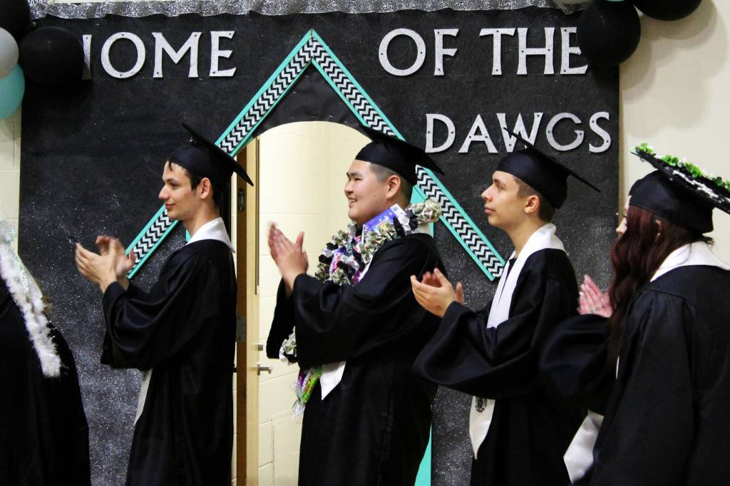 Nikiski Middle/High School graduates cheer on their peers while waiting to receive diplomas during a ceremony on Tuesday, May 16, 2023 in Nikiski, Alaska. (Ashlyn OHara/Peninsula Clarion)