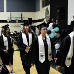 Nikiski Middle/High School graduates prepare to receive diplomas at a ceremony on Tuesday, May 16, 2023, in Nikiski, Alaska. (Ashlyn OHara/Peninsula Clarion)