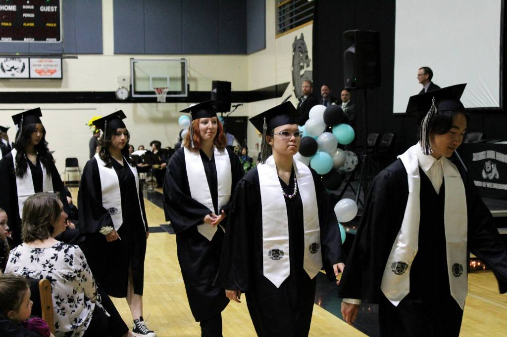 Nikiski Middle/High School graduates prepare to receive diplomas at a ceremony on Tuesday, May 16, 2023, in Nikiski, Alaska. (Ashlyn OHara/Peninsula Clarion)