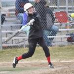Kenai Centrals Avia Miller hits against Homer on Tuesday, May 16, 2023, at Steve Shearer Memorial Ball Park in Kenai, Alaska. (Photo by Jeff Helminiak/Peninsula Clarion)