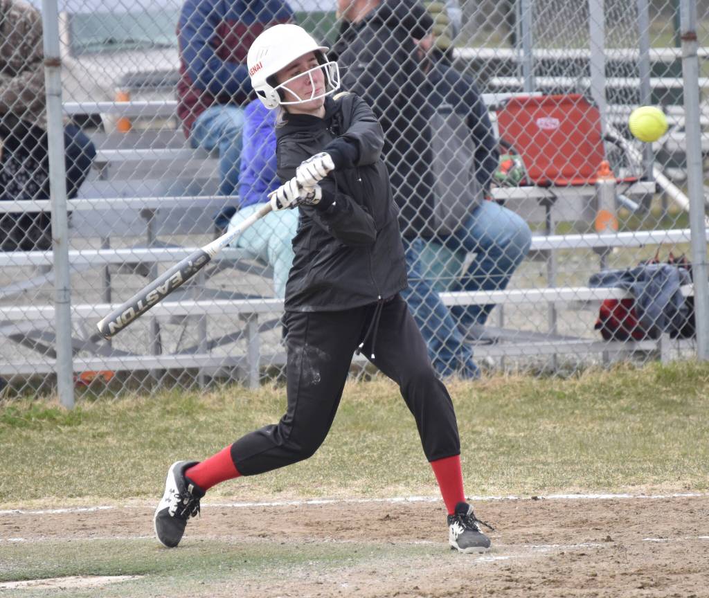Kenai Centrals Avia Miller hits against Homer on Tuesday, May 16, 2023, at Steve Shearer Memorial Ball Park in Kenai, Alaska. (Photo by Jeff Helminiak/Peninsula Clarion)