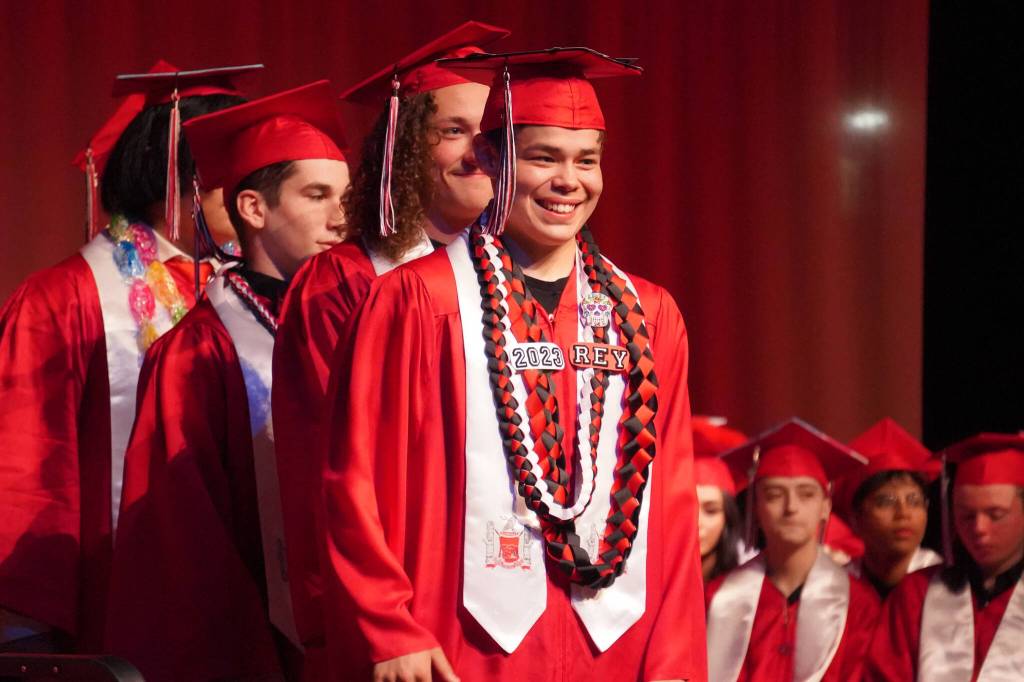 Kenai Central High School graduates wait to receive their diplomas during a graduation ceremony on Wednesday, May 17, 2023, at Kenai Central High School in Kenai, Alaska. (Jake Dye/Peninsula Clarion)