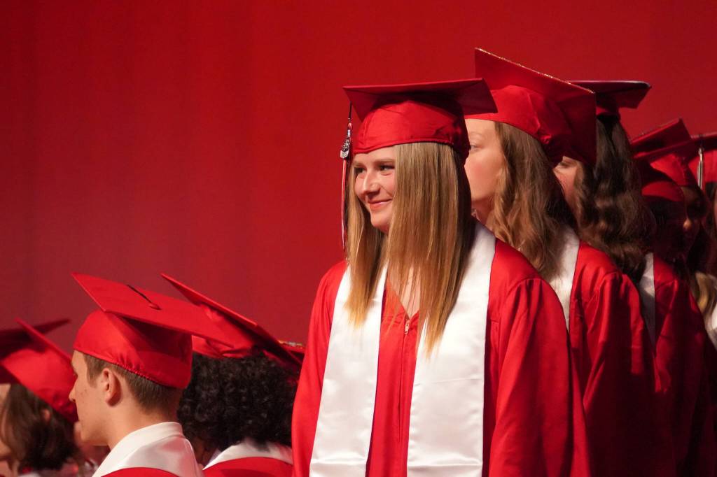 Kenai Central High School graduates wait to receive their diplomas during a graduation ceremony on Wednesday, May 17, 2023, at Kenai Central High School in Kenai, Alaska. (Jake Dye/Peninsula Clarion)