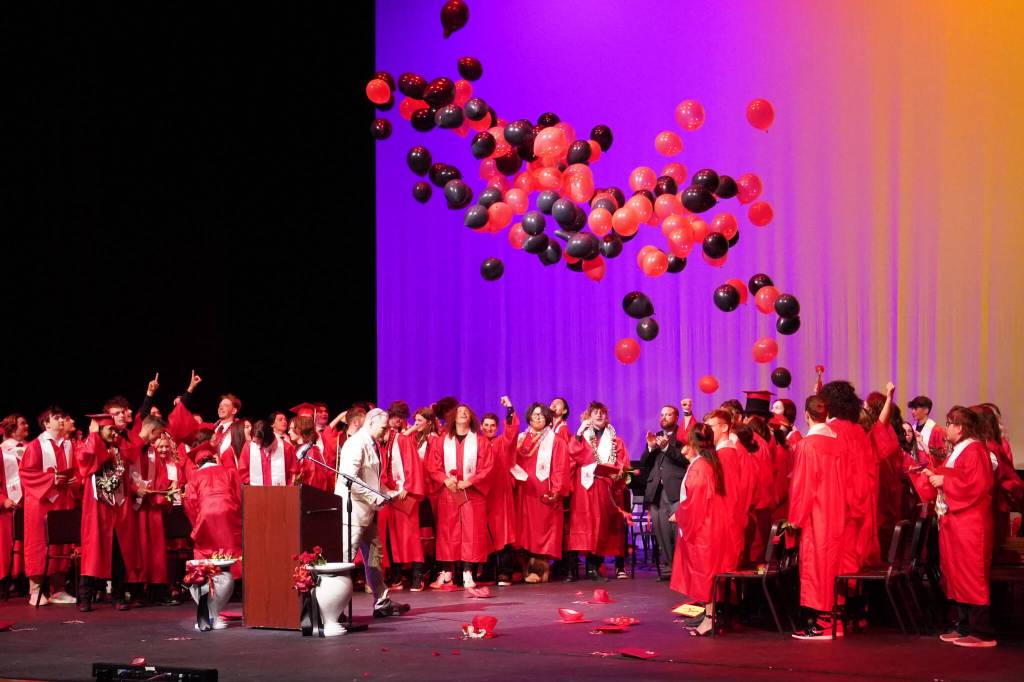 Kenai Central High School graduates celebrate after their graduation ceremony on Wednesday, May 17, 2023, at Kenai Central High School in Kenai, Alaska. (Jake Dye/Peninsula Clarion)