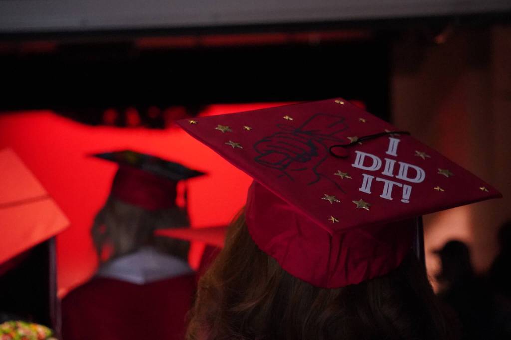 Kenai Central High School graduates file into the auditorium for their graduation ceremony on Wednesday, May 17, 2023, at Kenai Central High School in Kenai, Alaska. (Jake Dye/Peninsula Clarion)