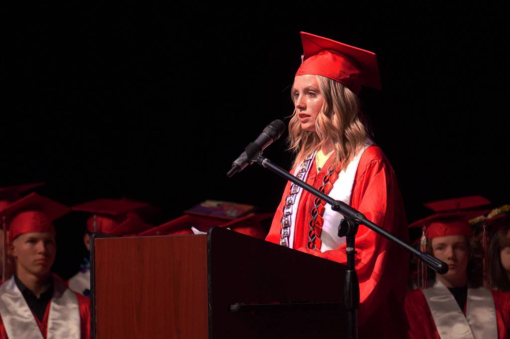 Class President Kori Moore addresses the Kenai Central High School Class of 2023 during a graduation ceremony on Wednesday, May 17, 2023, at Kenai Central High School in Kenai, Alaska. (Jake Dye/Peninsula Clarion)