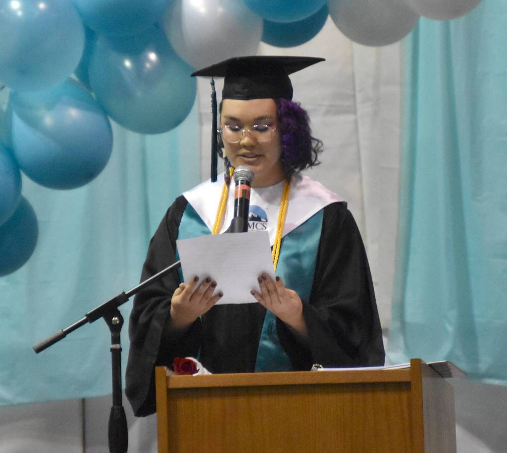 Salutatorian Esther Joseph gives an address at the River City Academy graduation Wednesday, May 17, 2023, at River City Academy inside Skyview Middle School just outside of Soldotna, Alaska. (Photo by Jeff Helminiak/Peninsula Clarion)