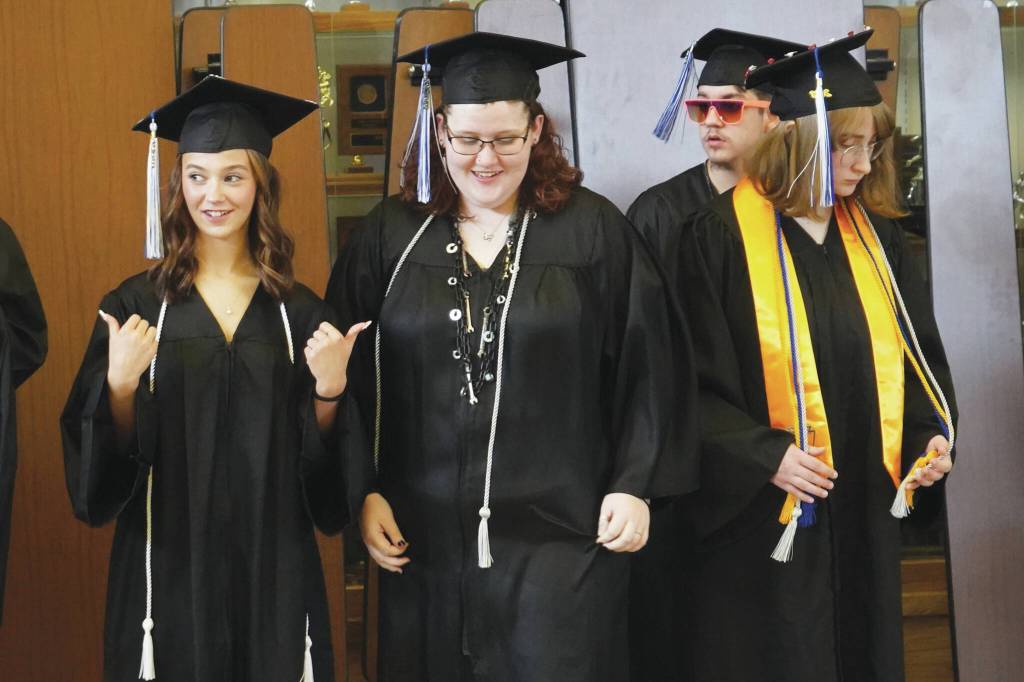 Jake Dye/Peninsula Clarion
Connections Homeschool students prepare to enter the auditorium ahead of the Connections Homeschool graduation ceremony on Thursday at Soldotna High School.