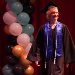 Connections Homeschool students take the stage to receive their diplomas during the Connections Homeschool graduation ceremony on Thursday, May 18, 2023, at Soldotna High School in Soldotna, Alaska. (Jake Dye/Peninsula Clarion)