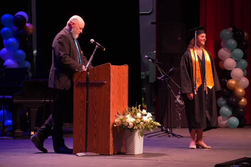 Connections Homeschool Principal Douglas Hayman speaks about Anna DeVolld during the Connections Homeschool graduation ceremony on Thursday, May 18, 2023, at Soldotna High School in Soldotna, Alaska. (Jake Dye/Peninsula Clarion)
Connections Homeschool Principal Douglas Hayman speaks about Anna DeVolld during the Connections Homeschool graduation ceremony on Thursday, May 18, 2023, at Soldotna High School in Soldotna, Alaska. (Jake Dye/Peninsula Clarion)