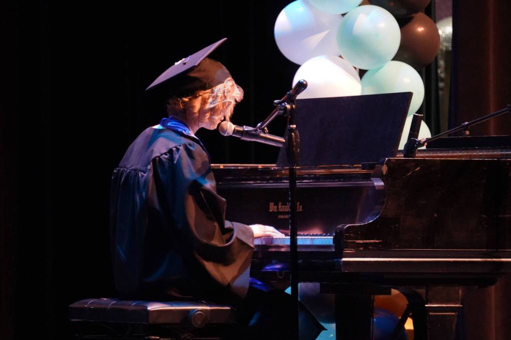 Lacie Triem perfrorms Dont Forget, by Toby Fox, during the Connections Homeschool graduation ceremony on Thursday, May 18, 2023, at Soldotna High School in Soldotna, Alaska. (Jake Dye/Peninsula Clarion)