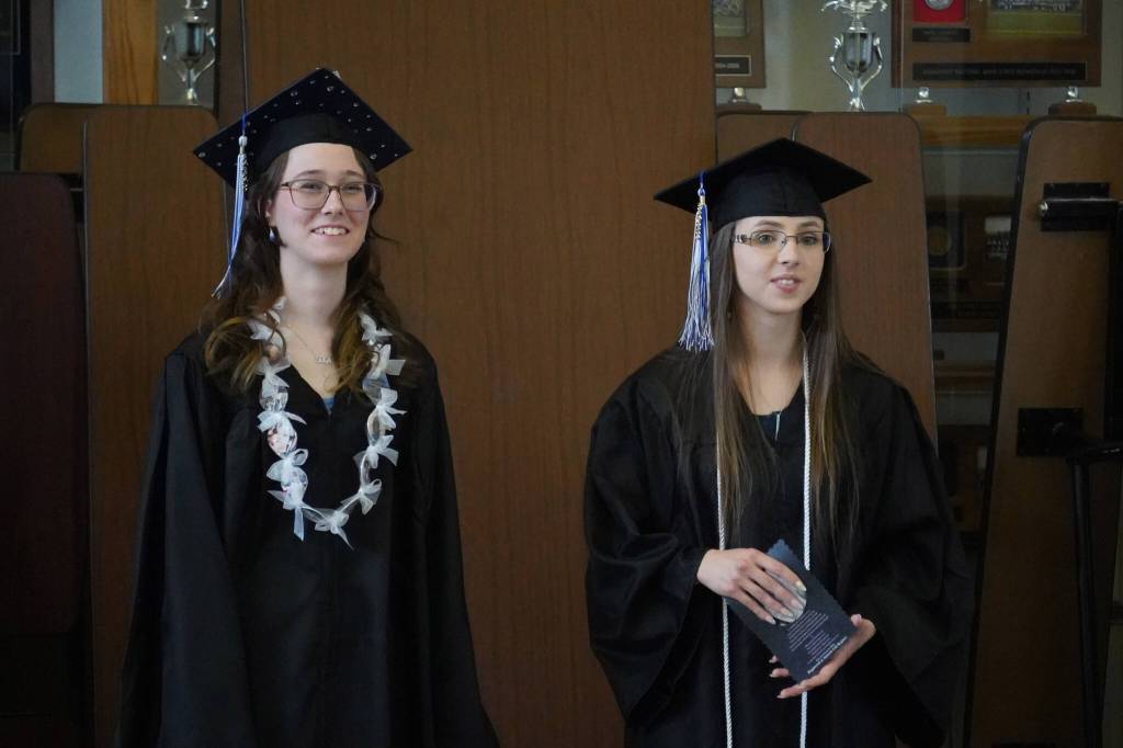 Connections Homeschool students prepare to enter the auditorium ahead of the Connections Homeschool graduation ceremony on Thursday, May 18, 2023, at Soldotna High School in Soldotna, Alaska. (Jake Dye/Peninsula Clarion)