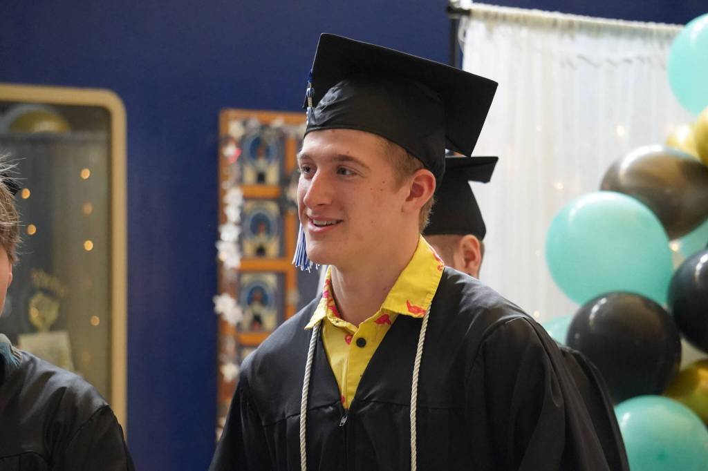 Connections Homeschool students prepare to enter the auditorium ahead of the Connections Homeschool graduation ceremony on Thursday, May 18, 2023, at Soldotna High School in Soldotna, Alaska. (Jake Dye/Peninsula Clarion)