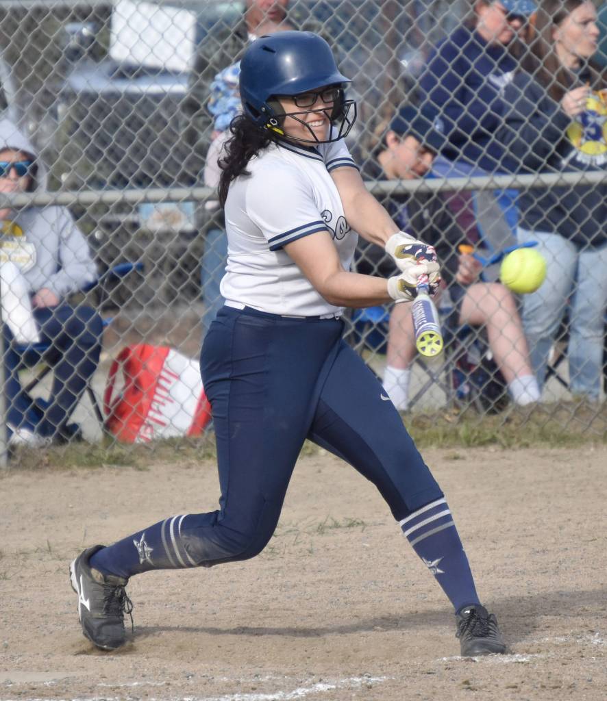 Soldotnas Miah Mead lines out against Kenai Central on Thursday, May 18, 2023, at the Soldotna Little League fields in Soldotna, Alaska. (Photo by Jeff Helminiak/Peninsula Clarion)