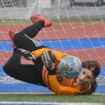 Homer goalie Felicia Weisser saves a penalty kick Friday, May 19, 2023, in the semifinals of the Peninsula Conference tournament at Justin Maile Field at Soldotna High School in Soldotna, Alaska. (Photo by Jeff Helminiak/Peninsula Clarion)