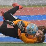 Homer goalie Felicia Weisser saves a penalty kick Friday, May 19, 2023, in the semifinals of the Peninsula Conference tournament at Justin Maile Field at Soldotna High School in Soldotna, Alaska. (Photo by Jeff Helminiak/Peninsula Clarion)